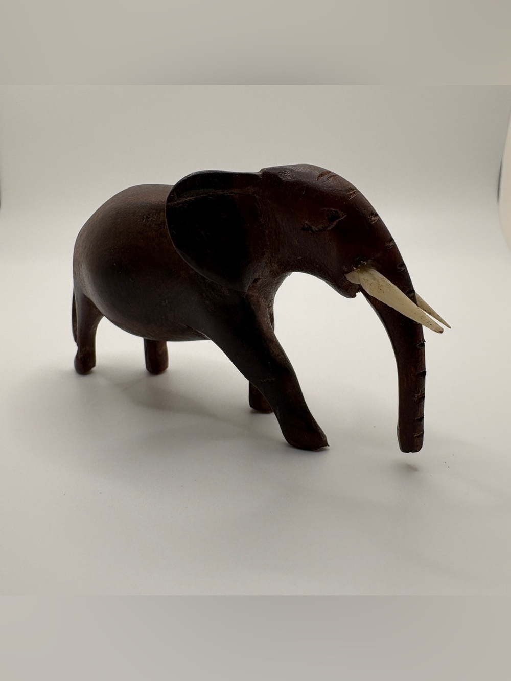 Vintage Wooden Elephant Miniature Figurine with dark wood tone